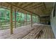 Wooden deck featuring wooden railings and view of the woods at 2551 Park Se Rd, Smyrna, GA 30080