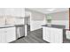 Modern kitchen featuring stainless steel appliances, white cabinetry and granite countertops at 2551 Park Se Rd, Smyrna, GA 30080