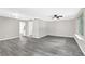 Inviting living room with hardwood floors, crown moulding, fan and large window at 2551 Park Se Rd, Smyrna, GA 30080