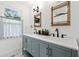 Modern bathroom featuring double vanity, sleek fixtures, and ample natural light at 428 Tibbetts Se St, Marietta, GA 30060
