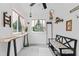 Sun-drenched entryway with bench seating, neutral walls, and ample decor at 428 Tibbetts Se St, Marietta, GA 30060