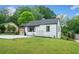 Well-maintained front lawn and landscaping enhance this updated single Gathering home at 428 Tibbetts Se St, Marietta, GA 30060