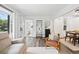 Inviting living room with hardwood floors, neutral tones, and contemporary furnishings bathed in natural light at 428 Tibbetts Se St, Marietta, GA 30060