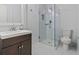 Bathroom with a modern vanity, shower, and white subway tile at 95 Ivy Ne Trl, Atlanta, GA 30342