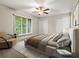 Bedroom with soft carpet, large window, and closet at 95 Ivy Ne Trl, Atlanta, GA 30342
