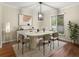 Dining room with modern light fixture and decor at 95 Ivy Ne Trl, Atlanta, GA 30342