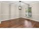 Neutral dining area filled with natural light and hardwood flooring at 95 Ivy Ne Trl, Atlanta, GA 30342