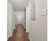 Hallway has hardwood flooring and white doors at 95 Ivy Ne Trl, Atlanta, GA 30342