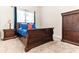 Comfortable bedroom with neutral-colored walls and matching furniture at 953 Auburn Rd, Dacula, GA 30019