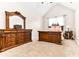 Elegant bedroom features a vaulted ceiling, large window, and beautifully carved wood furniture set at 953 Auburn Rd, Dacula, GA 30019
