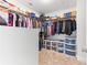 Spacious walk-in closet featuring plenty of shelving for optimal storage at 953 Auburn Rd, Dacula, GA 30019
