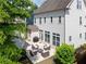 Aerial view of a backyard patio with seating arrangement, ideal for outdoor gatherings at 1085 Celebration Dr, Roswell, GA 30076