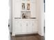 Chic butlers pantry with custom cabinetry and convenient beverage storage at 1085 Celebration Dr, Roswell, GA 30076