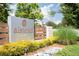 Welcoming entrance to the Alstead community, featuring attractive signage and well-maintained landscaping for residents at 1085 Celebration Dr, Roswell, GA 30076