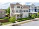 Charming two-story home featuring a covered porch and well-maintained landscaping, perfect for suburban living at 1085 Celebration Dr, Roswell, GA 30076