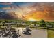 Scenic sunset view from the outdoor lounge area, offering breathtaking views of the surrounding landscape and community at 1085 Celebration Dr, Roswell, GA 30076