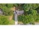 An aerial view of the home surrounded by mature trees at 4524 Shumart Dr, Snellville, GA 30039