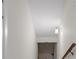 Basement hallway with simple lighting and neutral walls leading to a finished area at 4524 Shumart Dr, Snellville, GA 30039