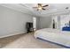 Spacious main bedroom features a trey ceiling and ensuite bathroom at 4524 Shumart Dr, Snellville, GA 30039