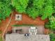 Aerial view of the deck and fire pit area with seating and landscaping at 4674 Lakeway Pl, Alpharetta, GA 30005