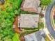 Aerial view of the house showcasing the roof, deck with furniture and a fire pit at 4674 Lakeway Pl, Alpharetta, GA 30005