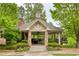 Community amenity with stone pillars and outdoor seating at 4674 Lakeway Pl, Alpharetta, GA 30005