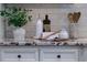 Bright kitchen features tile backsplash, granite countertops, white cabinetry, and kitchen decor at 4674 Lakeway Pl, Alpharetta, GA 30005