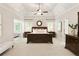 Spacious main bedroom featuring tray ceilings, neutral color palette, and a sitting room at 4674 Lakeway Pl, Alpharetta, GA 30005