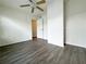 Spacious bedroom with fan and hardwood flooring at 1812 Ashborough Se Cir # C, Marietta, GA 30067