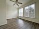 Bedroom featuring two windows allowing for ample light and fan at 1812 Ashborough Se Cir # C, Marietta, GA 30067