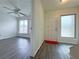 Home entryway featuring new flooring and a view into a living room at 1812 Ashborough Se Cir # C, Marietta, GA 30067