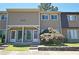 Charming townhome featuring a well-maintained front yard and neutral-toned exterior at 1812 Ashborough Se Cir # C, Marietta, GA 30067