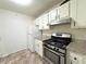Bright kitchen with updated appliances and granite countertops at 1812 Ashborough Se Cir # C, Marietta, GA 30067