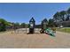 A playground area contains a swing set, slide and other climbing options, offering outdoor recreation at 1812 Ashborough Se Cir # C, Marietta, GA 30067