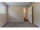 Comfortable bedroom with neutral decor, modern carpet and plenty of sunlight at 2212 Chestnut Log Loop, Lithia Springs, GA 30122