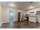 Bright kitchen featuring stainless steel appliances, granite countertops, and ample cabinet space at 2212 Chestnut Log Loop, Lithia Springs, GA 30122