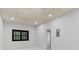 Spacious basement with a window for natural light and access to another room at 4978 Thornwood Nw Cv, Acworth, GA 30102
