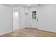 Finished basement with a door leading to the backyard and doorway to another room at 4978 Thornwood Nw Cv, Acworth, GA 30102