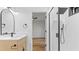 Modern bathroom featuring large shower with black hardware and vanity at 4978 Thornwood Nw Cv, Acworth, GA 30102