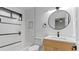 Modern bathroom with a glass-enclosed shower, sleek vanity, and contemporary fixtures at 4978 Thornwood Nw Cv, Acworth, GA 30102