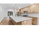 Modern kitchen boasts quartz countertops, stainless steel appliances, and ample cabinet space at 4978 Thornwood Nw Cv, Acworth, GA 30102