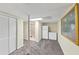 Finished basement featuring carpet floors, storage, and an adjacent bathroom; ideal for extra living space at 509 Orchards Walk, Stone Mountain, GA 30087