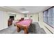 Finished basement featuring a pool table, seating area, and ample space for entertainment at 509 Orchards Walk, Stone Mountain, GA 30087