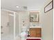 Well-lit bathroom with a glass-enclosed shower, a vanity with a sink, and a neutral color scheme at 509 Orchards Walk, Stone Mountain, GA 30087