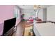 Large bedroom with a ceiling fan, two twin beds, and an exercise machine; perfect for Gathering and fitness at 509 Orchards Walk, Stone Mountain, GA 30087