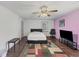 Spacious bedroom with a modern bed, a large window, and a cozy rug for a comfortable atmosphere at 509 Orchards Walk, Stone Mountain, GA 30087