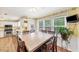 Open-concept kitchen and breakfast nook featuring views to the backyard at 509 Orchards Walk, Stone Mountain, GA 30087