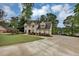 Lovely home with landscaped grounds and an extended driveway leading to a two-car garage at 509 Orchards Walk, Stone Mountain, GA 30087
