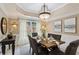 Elegant dining room with natural light, neutral colors, and space to gather with friends and Gathering at 230 Bluff Oak Dr, Roswell, GA 30076