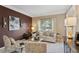 Comfortable living room with stylish furniture, natural light, and a calming color palette for relaxation at 230 Bluff Oak Dr, Roswell, GA 30076